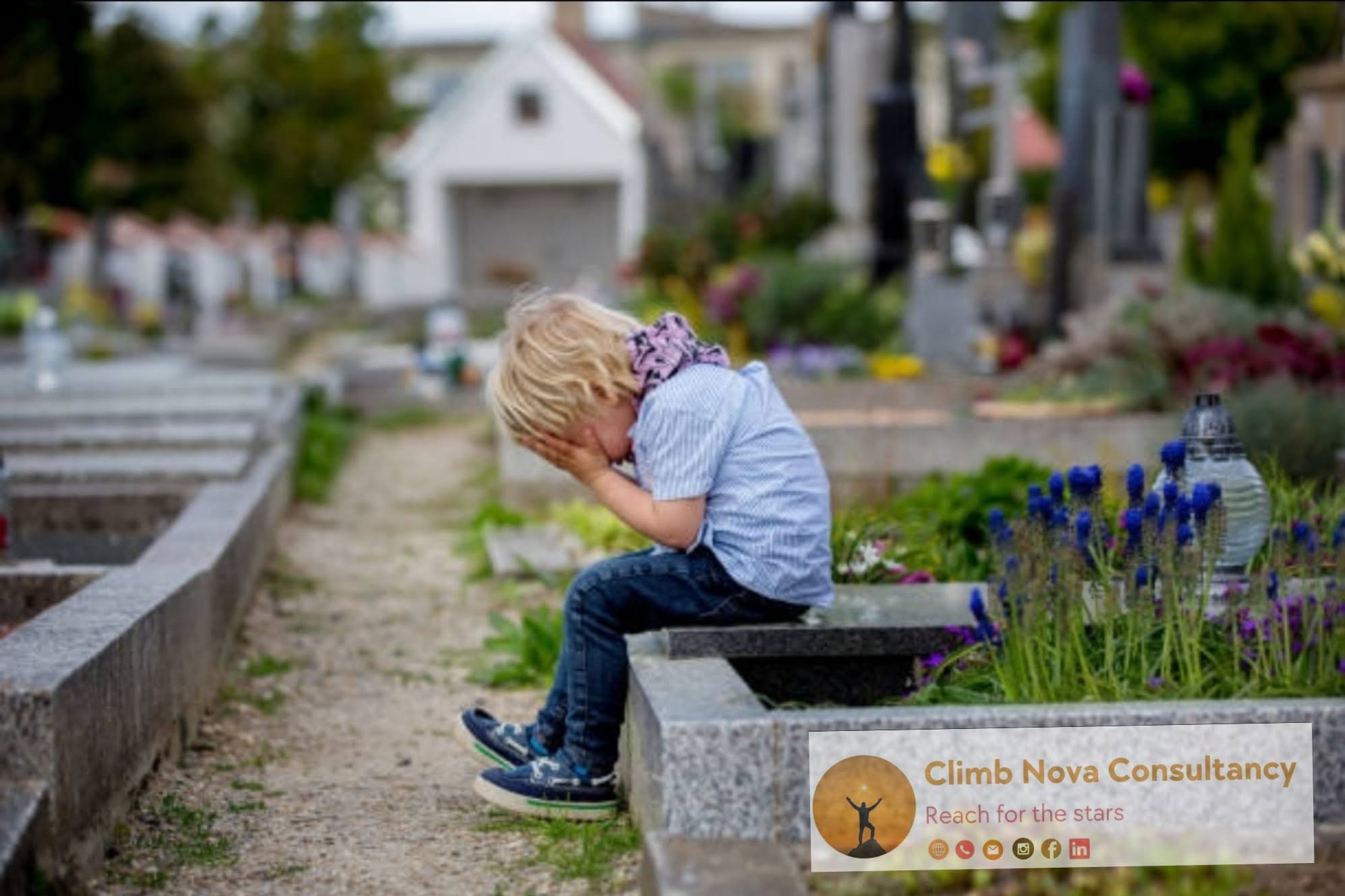 A young boy sitting down crying, representing grief and family pain