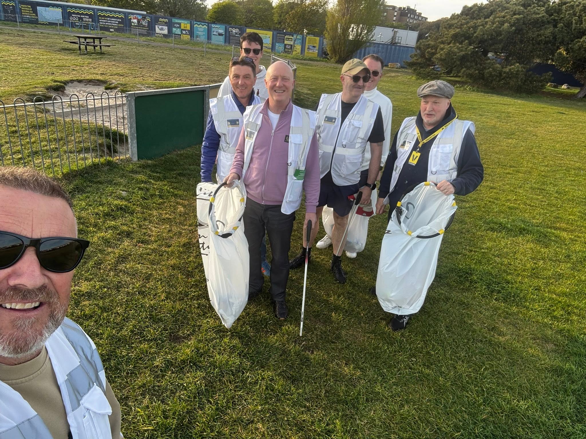 Protect Our Parks Portsmouth volunteers collecting litter in a green space